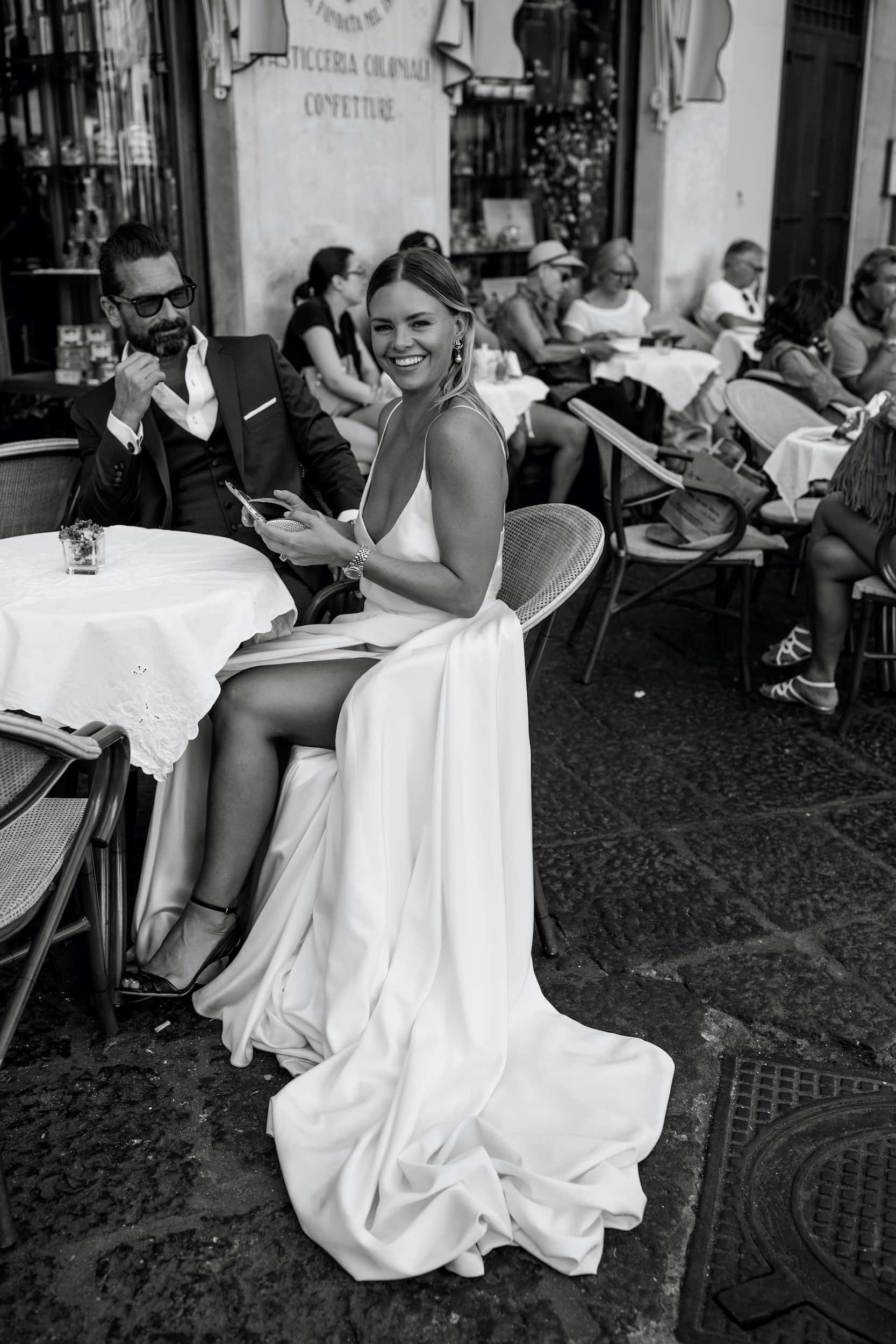 Bride and groom eating a gelato on the Amalfi Coast after their elopement