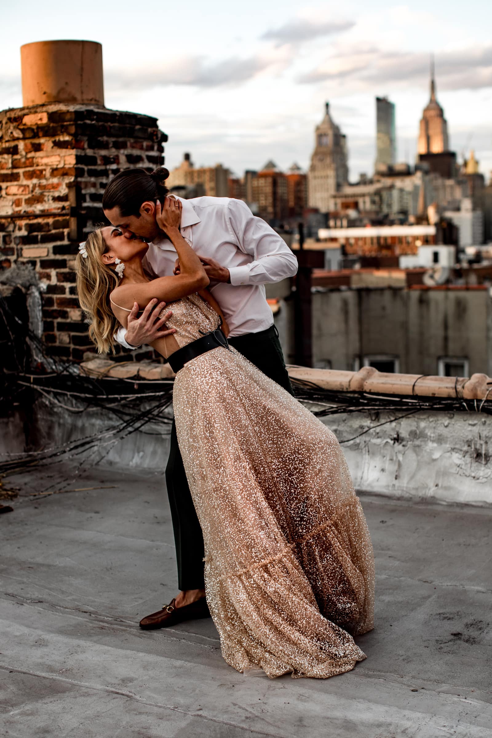 New York elopement kiss at sunset on top of the rooftop